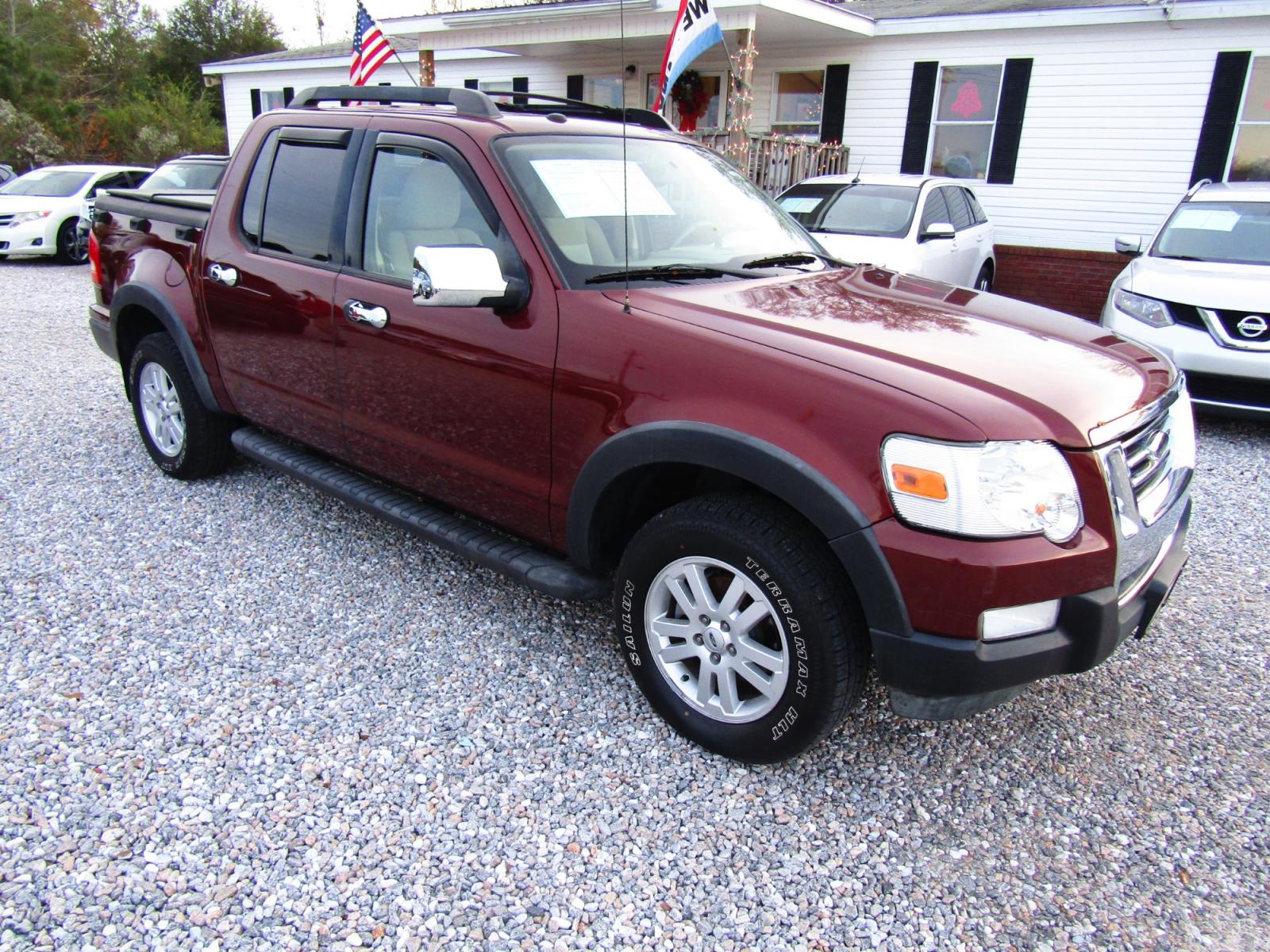 2010 Bronze /Tan Ford Explorer Sport Trac XLT 4.0L 2WD (1FMEU3BE3AU) with an 4.0L V6 SOHC 12V engine, Automatic transmission, located at 15016 S Hwy 231, Midland City, AL, 36350, (334) 983-3001, 31.306210, -85.495277 - Photo #0